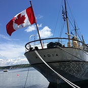 CSS Acadia with Canada Day flag 