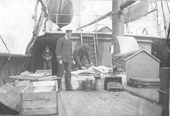 Preparing bodies aboard the cable ship Minia