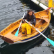 A student learning to row a yawl in Halifax Harbour.