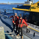 Ross Macfadden & Ian Wallace standing on a wharf.