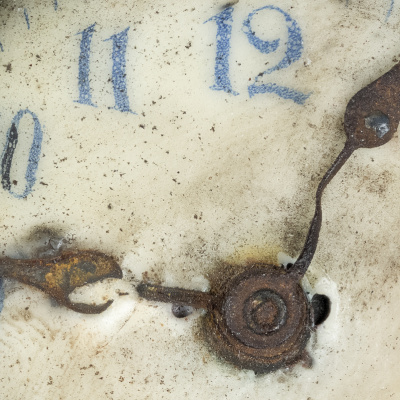 Clock found in explosion wreckage, back.