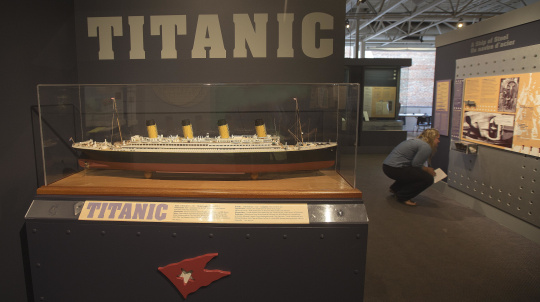 Entrance to the exhibit Titanic: The Unsinkable Ship and Halifax, model of the RMS Titanic in the foreground.