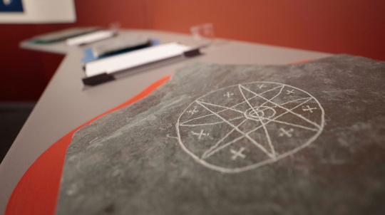 Replica Mi'kmaw petroglyph on display.